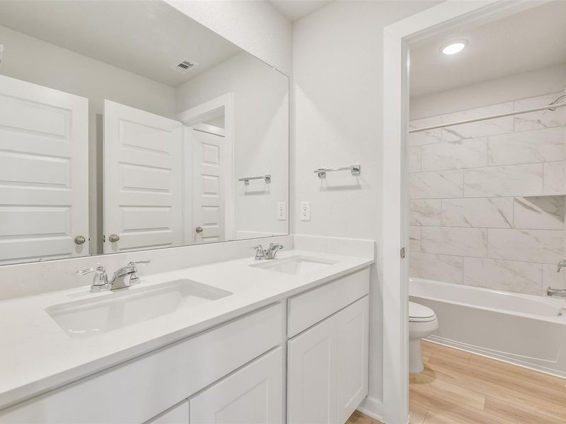 Furnished interior view inside a new home in Lakes at Black Oak, Magnolia (Image 10). Furnished interior view inside a new home in Lakes at Black Oak, Magnolia (Image 10).