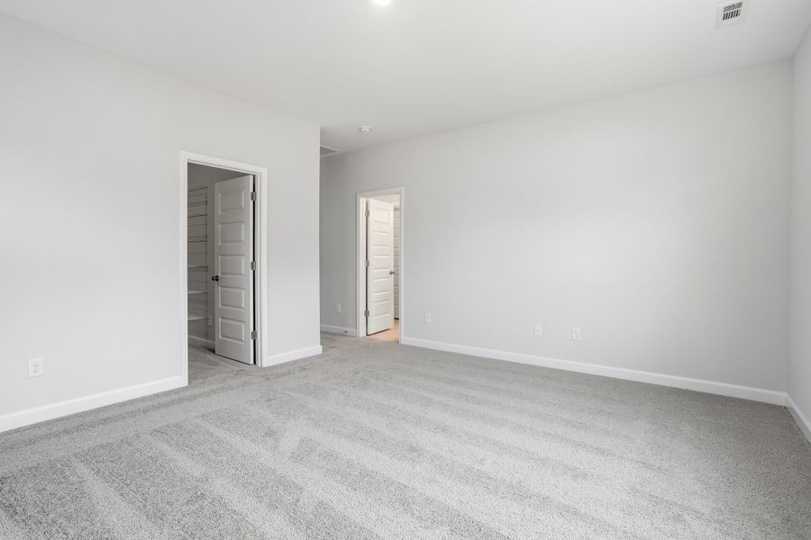 Spacious, unfurnished interior of a new home in Renaissance at White Oak, Garner (Image 20).