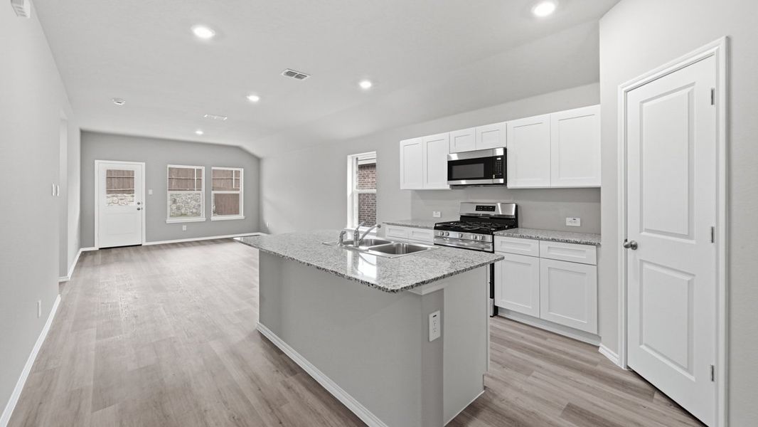 Representative furnished interior of a home built from the Dalton by D.R. Horton in Rock Creek West, Fort Worth (Image 5).