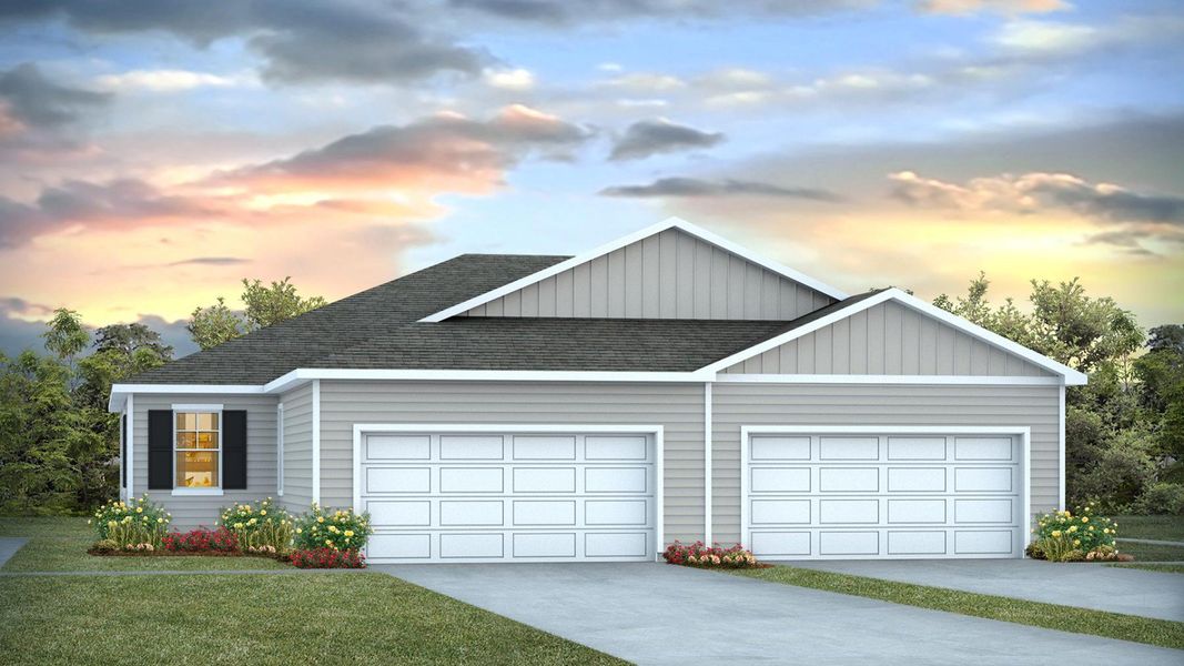 Front exterior of a new home in Indigo Preserve Townhomes, Leland, NC, highlighting curb appeal (Image 1).