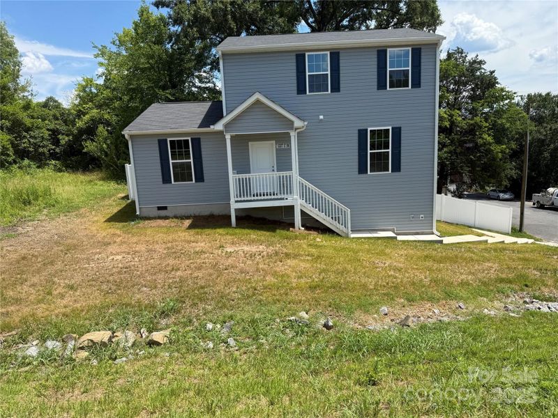 Front exterior of a new home in , Concord, NC, highlighting curb appeal (Image 12). Front exterior of a new home in , Concord, NC, highlighting curb appeal (Image 12).