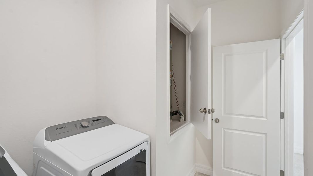Furnished interior view inside a new home in Heritage Station, Punta Gorda (Image 13).