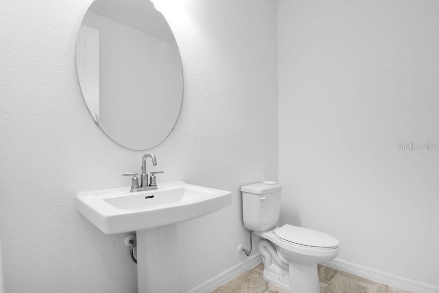 Furnished interior view inside a new home in Ardisia Park, New Smyrna Beach (Image 19).