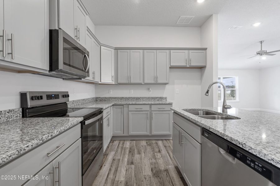 Furnished interior view inside a new home in , Green Cove Springs (Image 7).