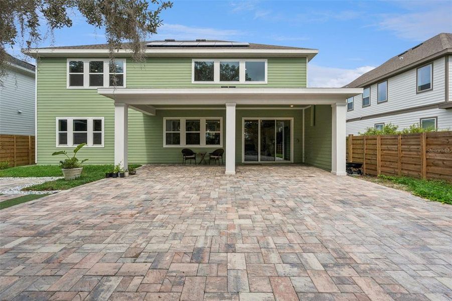 Exterior details and patio area of a home in Weslyn Park at Sunbridge, St. Cloud (Image 30).