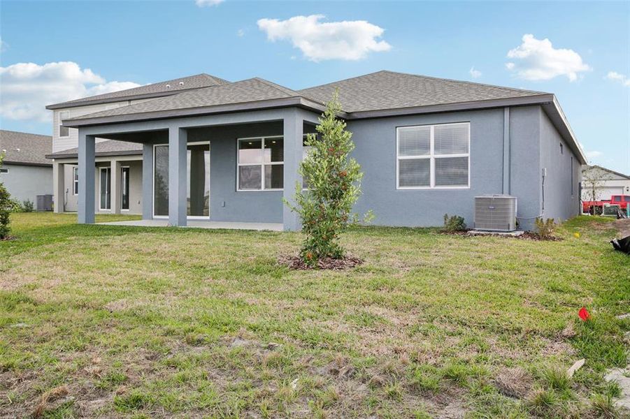 Exterior details and patio area of a home in Coasterra - Reserve Series, Palmetto (Image 27).