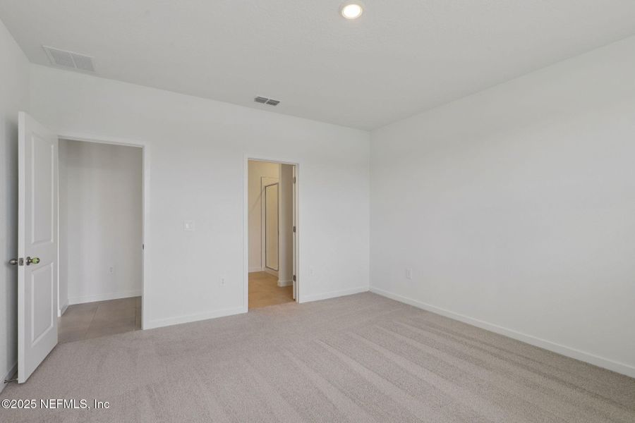 Spacious, unfurnished interior of a new home in Lakes at Bella Lago - Signature Series, Green Cove Springs (Image 21). Spacious, unfurnished interior of a new home in Lakes at Bella Lago - Signature Series, Green Cove Springs (Image 21).