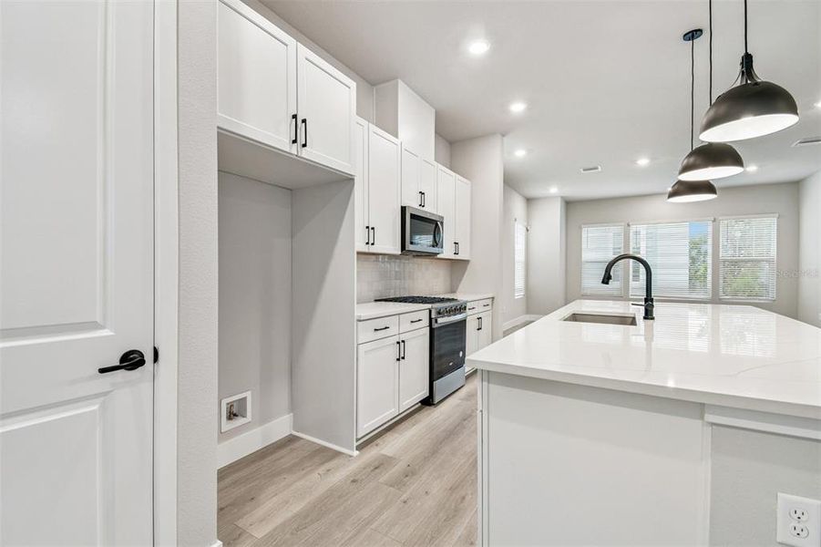 Furnished interior view inside a new home in Towns at Union, St. Petersburg (Image 5).