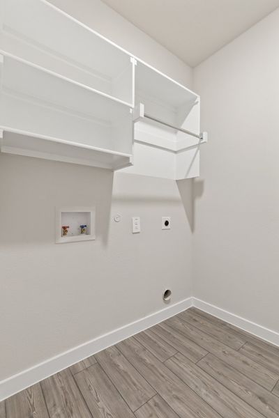 Utility room in the Elm home plan by Trophy Signature Homes – REPRESENTATIVE PHOTO