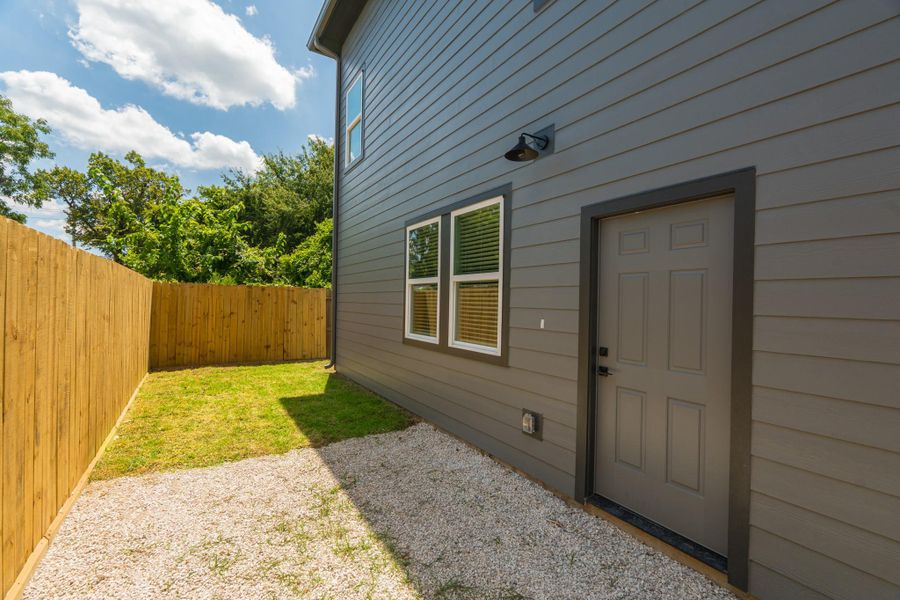 Exterior details and patio area of a home in , Humble (Image 3). Exterior details and patio area of a home in , Humble (Image 3).