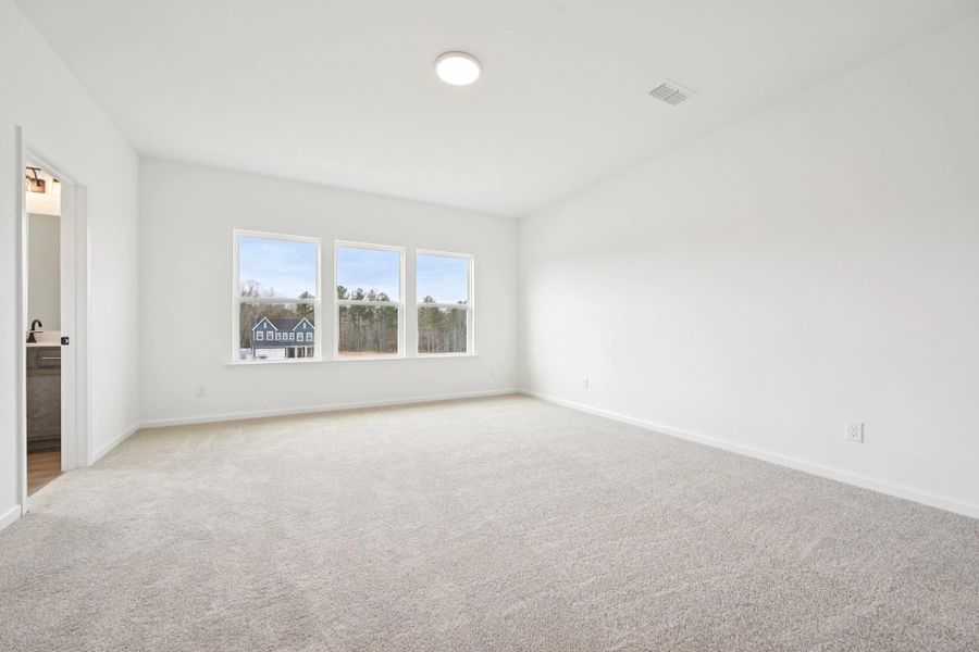 Primary Bedroom featuring AW Collection® Oxford - Calming flow with grounded sophistication. Primary Bedroom featuring AW Collection® Oxford - Calming flow with grounded sophistication.