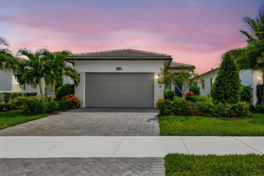 Front exterior of a new home in , Port St. Lucie, FL, highlighting curb appeal (Image 21).