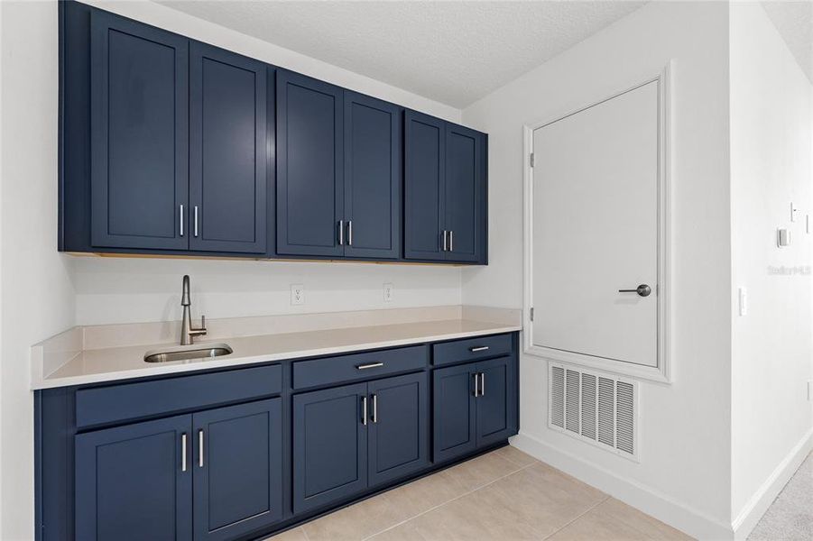 Furnished interior view inside a new home in Harvest At Ovation 50s, Winter Garden (Image 13).