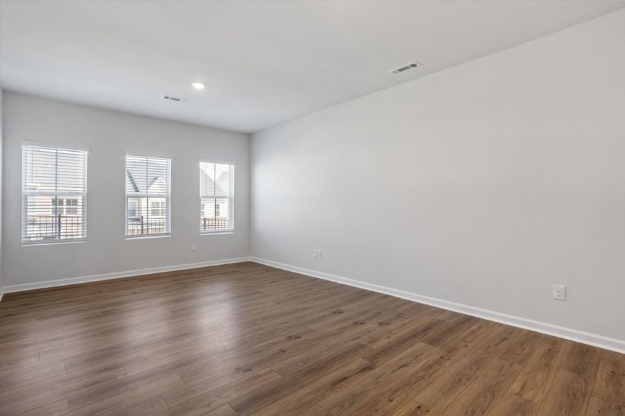 Spacious, unfurnished interior of a new home in Renaissance at White Oak, Garner (Image 14).