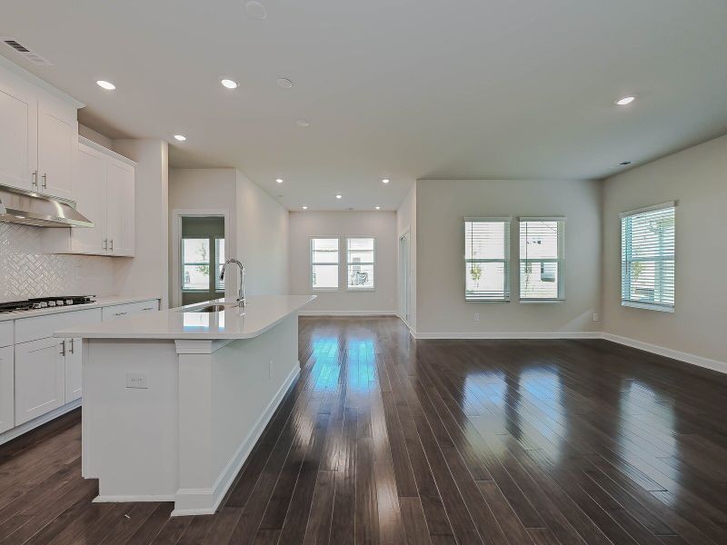 Large windows allow light into living space.