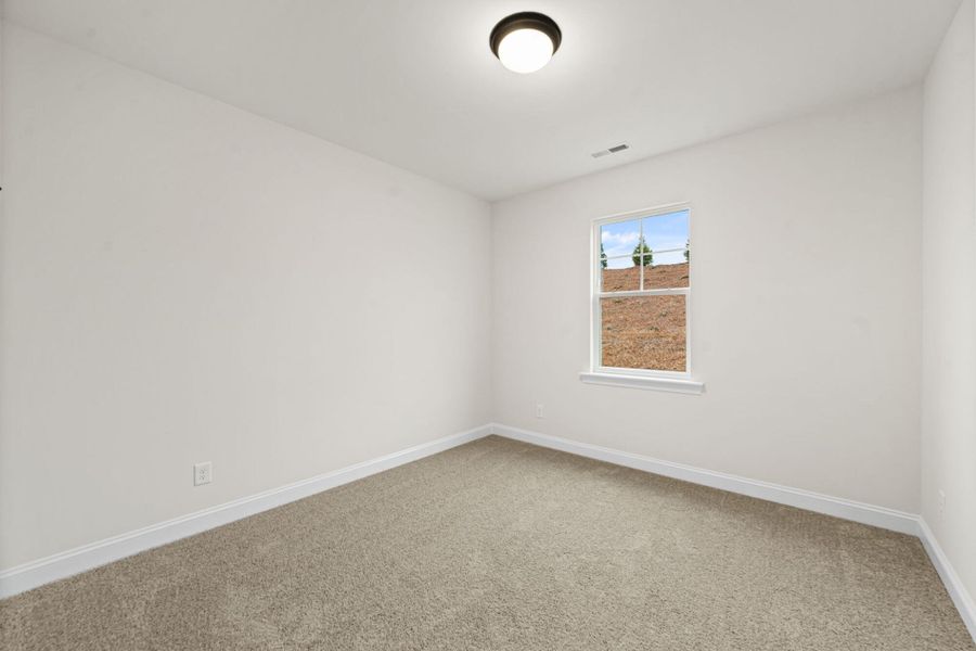 Spacious, unfurnished interior of a new home in Pisgah Park, Kernersville (Image 32).