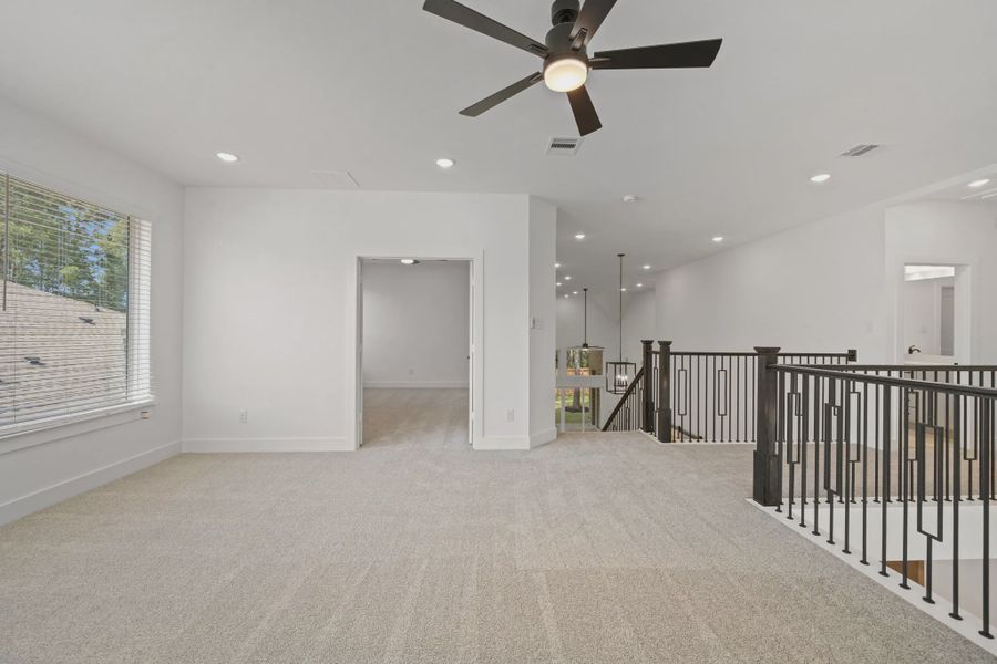 Representative unfurnished interior of a home built from the Waterloo by Chesmar Homes in Lakes of Cane Island, Katy (Image 22). Representative unfurnished interior of a home built from the Waterloo by Chesmar Homes in Lakes of Cane Island, Katy (Image 22).