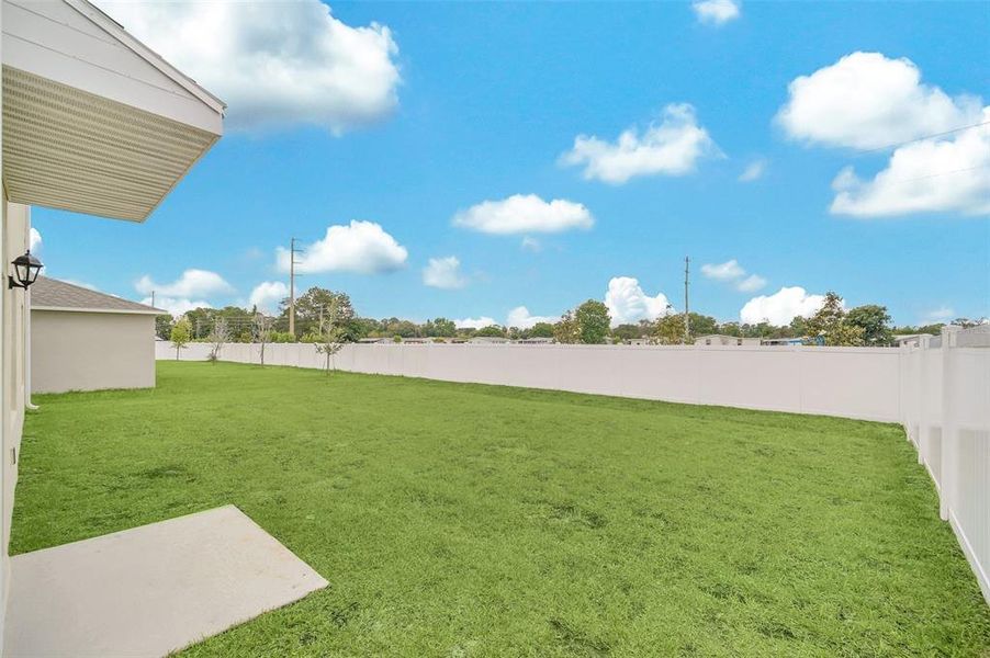 Front exterior of a new home in Greenbrier, Tavares, FL, highlighting curb appeal (Image 23).