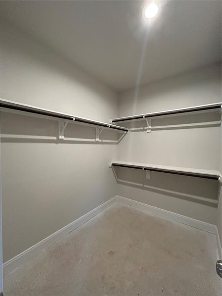 Primary Suite spacious walk-in closet Primary Suite spacious walk-in closet