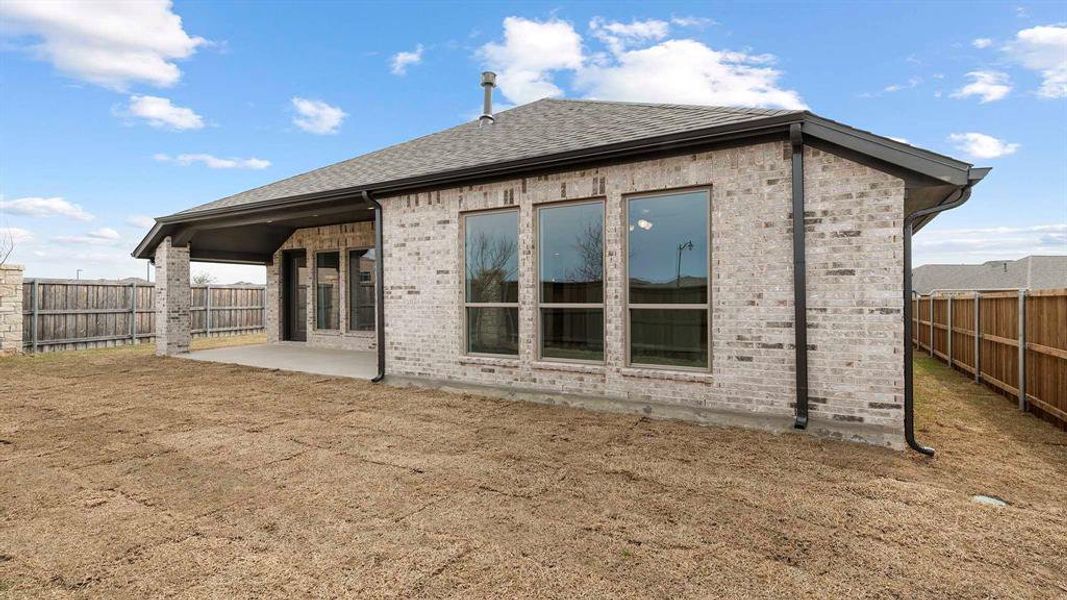 Exterior details and patio area of a home in Devonshire, Forney (Image 3).