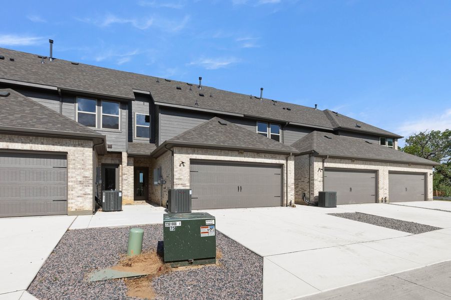 Front exterior of a new home in Timber Ridge, Corinth, TX, highlighting curb appeal (Image 28).