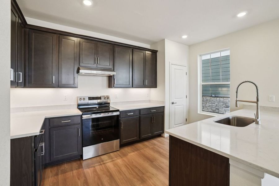 Furnished interior view inside a new home in Windler Wildflower, Aurora (Image 6).