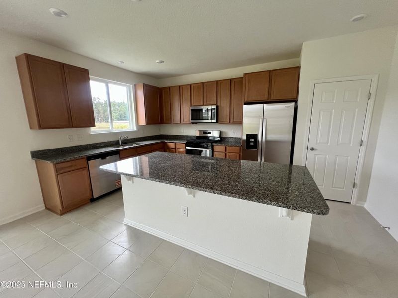 Furnished interior view inside a new home in Anabelle Island - Executive Series, Green Cove Springs (Image 8).