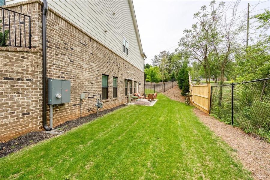 Front exterior of a new home in , Marietta, GA, highlighting curb appeal (Image 19). Front exterior of a new home in , Marietta, GA, highlighting curb appeal (Image 19).