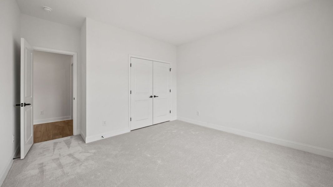 The Brentwood Plan by DRB Homes in River District, Charlotte NC.- Bedroom The Brentwood Plan by DRB Homes in River District, Charlotte NC.- Bedroom