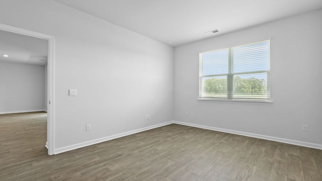 Spacious, unfurnished interior of a new home in Pine Hills at Cane Bay, Summerville (Image 18).