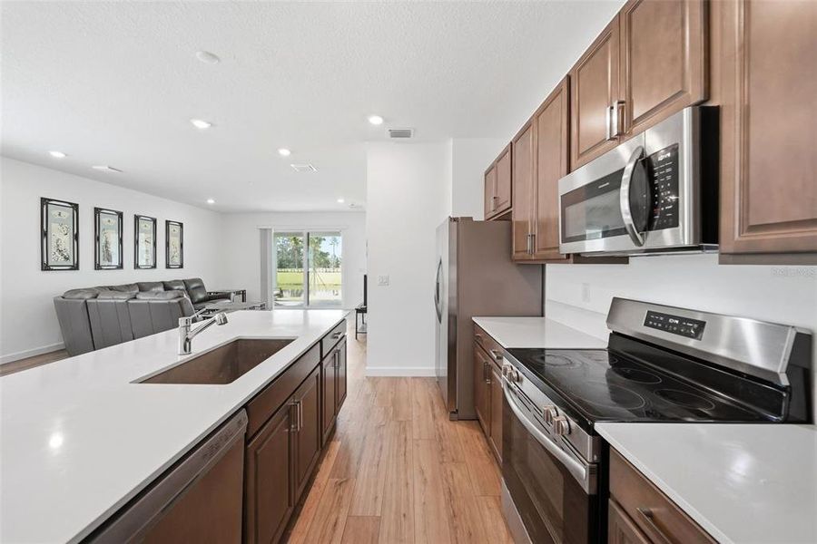 Furnished interior view inside a new home in The Timbers at Everlands, Palm Bay (Image 11).