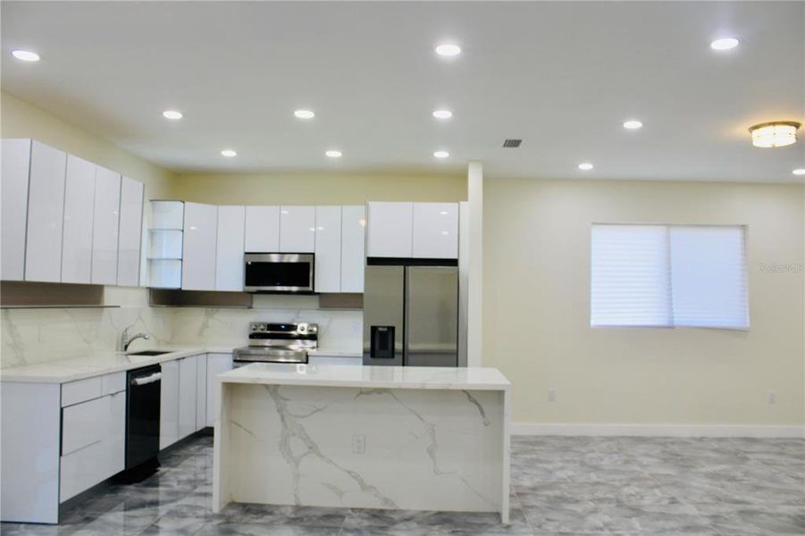 Furnished interior view inside a new home in , Port Charlotte (Image 8).