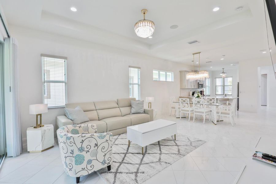 Furnished interior view inside a new home in PGA Village Verano, Port St. Lucie (Image 38).