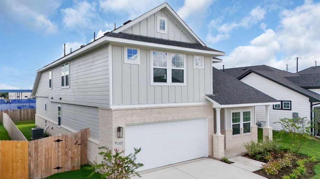 Front exterior of a new home in Nolina, Georgetown, TX, highlighting curb appeal (Image 34).
