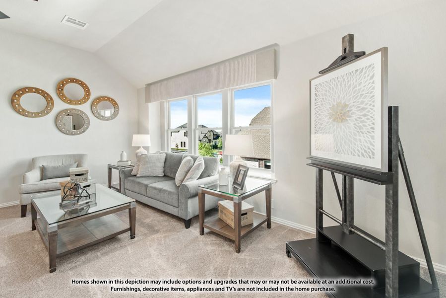 Living room with gray sofa, glass coffee table, decorative mirrors, and large windows with neighborhood view Living room with gray sofa, glass coffee table, decorative mirrors, and large windows with neighborhood view