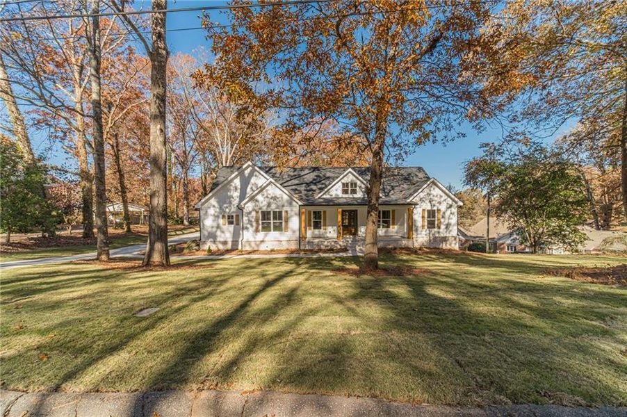 Front exterior of a new home in , Monroe, GA, highlighting curb appeal (Image 27).
