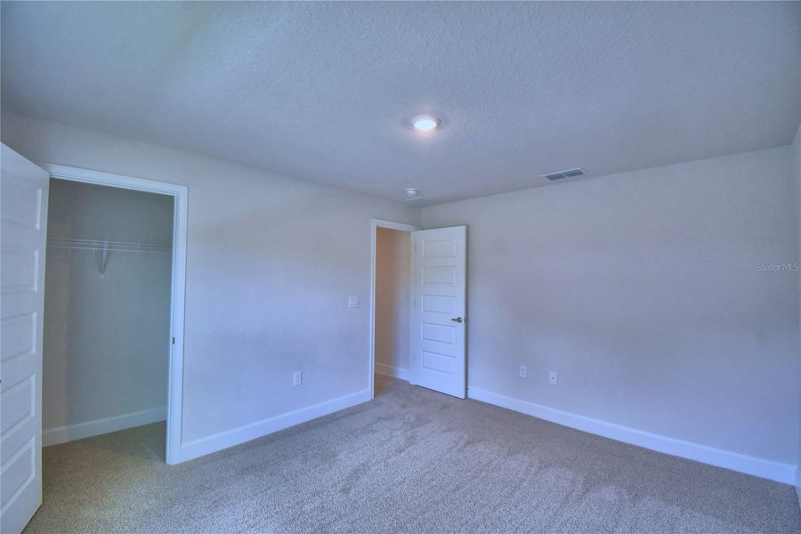 Spacious, unfurnished interior of a new home in Cadence Crossing, Auburndale (Image 23).