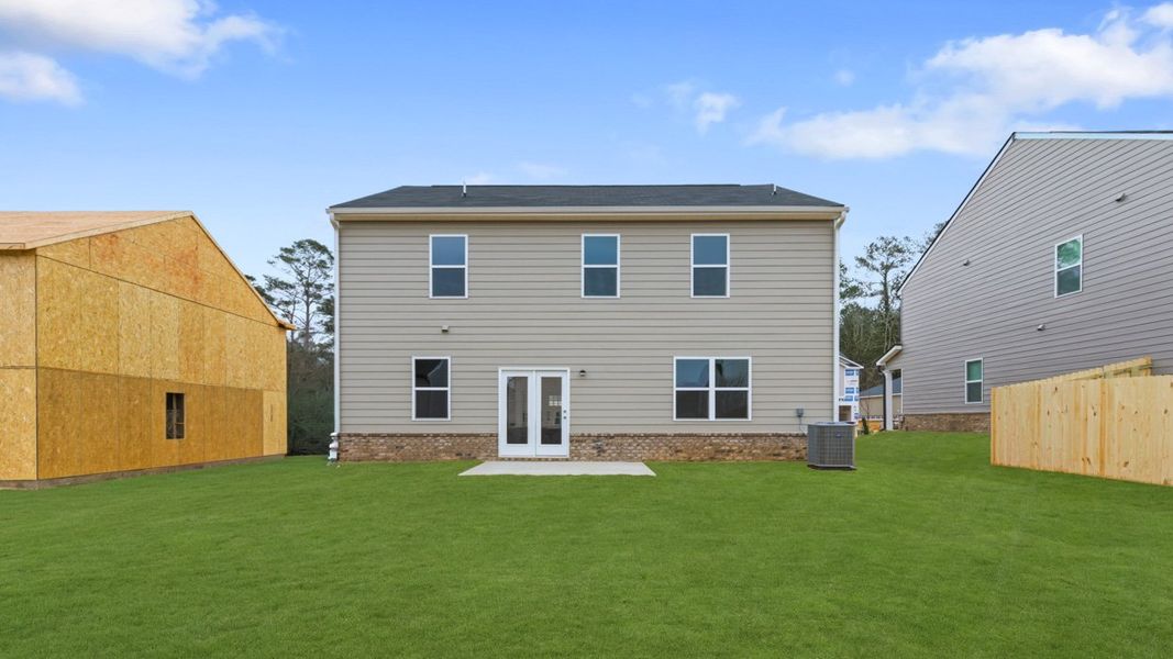 Exterior details and patio area of a home in The Reserve at Calcutta, Stockbridge (Image 3).
