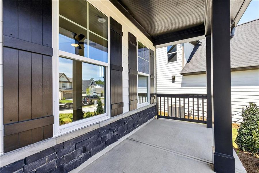 Exterior details and patio area of a home in Twin Lakes, Hoschton (Image 22).