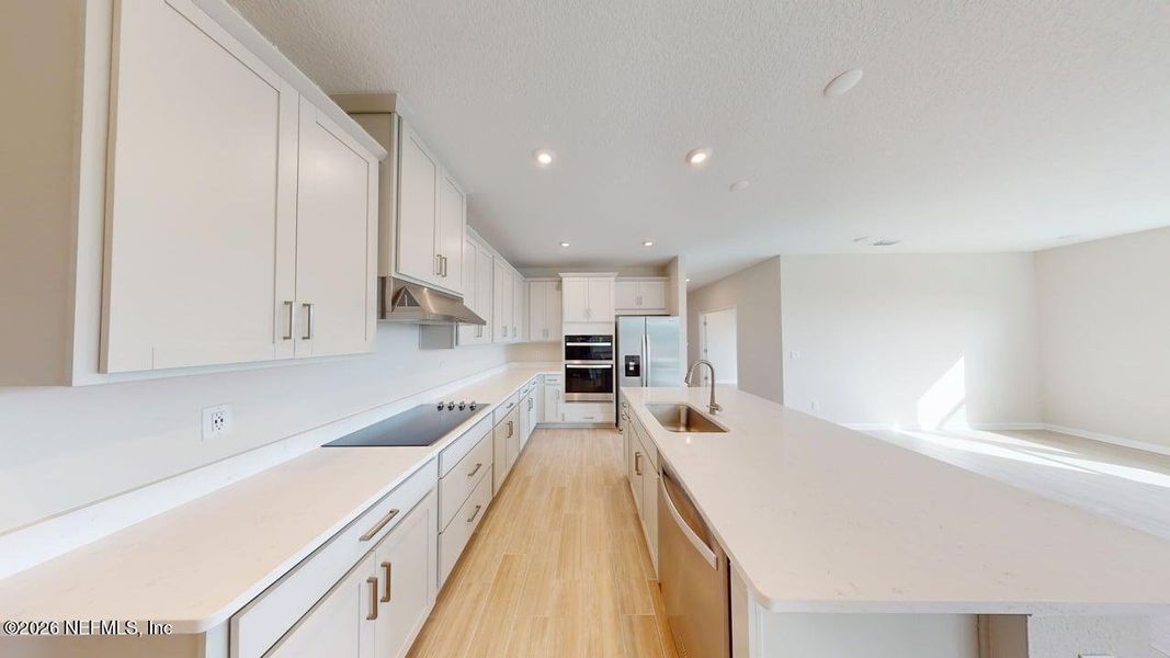 Furnished interior view inside a new home in Lakes at Bella Lago, Green Cove Springs (Image 5).
