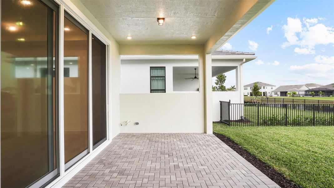 Exterior details and patio area of a home in Cresswind Palm Beach at Westlake, Westlake (Image 28).
