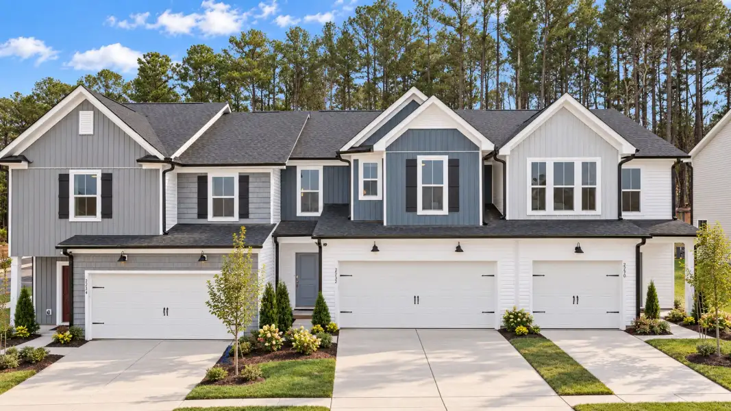Front exterior of a new home in Solana, Durham, NC, highlighting curb appeal (Image 1). Front exterior of a new home in Solana, Durham, NC, highlighting curb appeal (Image 1).