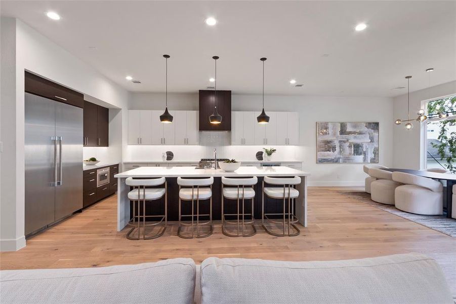 Beautiful kitchen overlooking living room and next to dining room