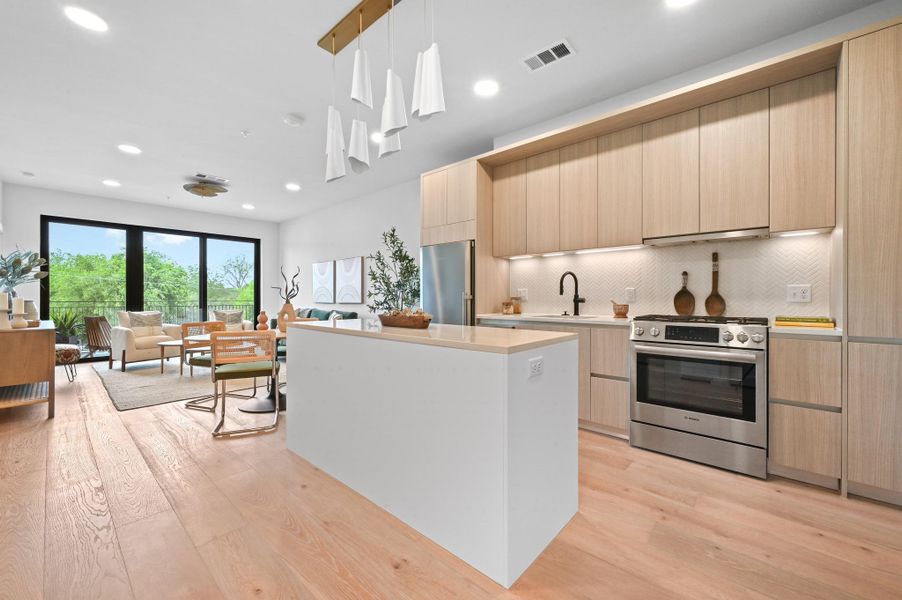 Furnished interior view inside a new home in One Oak, Austin (Image 6).