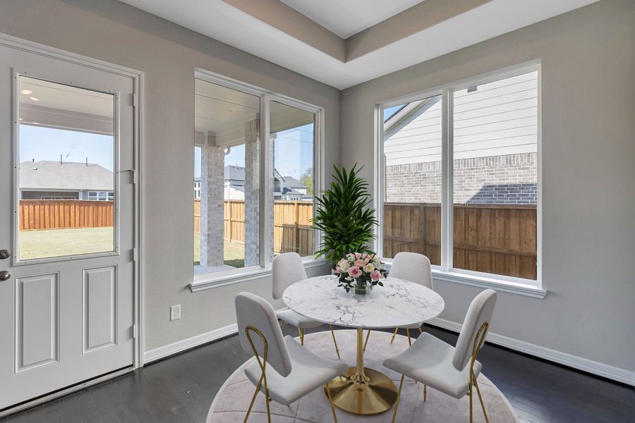 Dining area. Note: Sample product photo - actual exterior and interior selections may vary by homesite