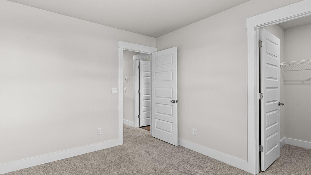 Spacious, unfurnished interior of a new home in The Haven at Indigo Preserve, Leland (Image 30).
