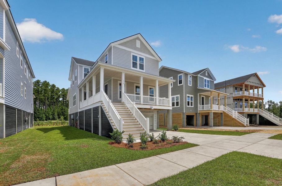 Front exterior of a new home in , Summerville, SC, highlighting curb appeal (Image 2). Front exterior of a new home in , Summerville, SC, highlighting curb appeal (Image 2).