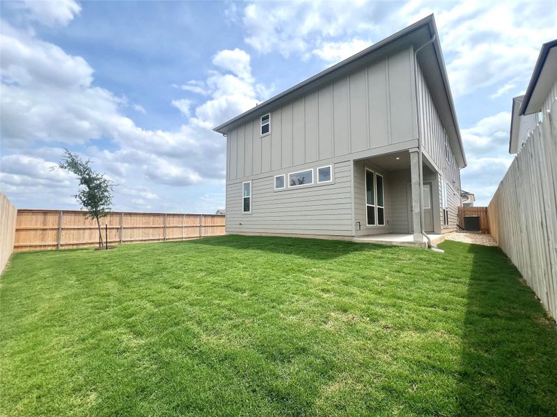 Exterior details and patio area of a home in Porter Country, Buda (Image 2).