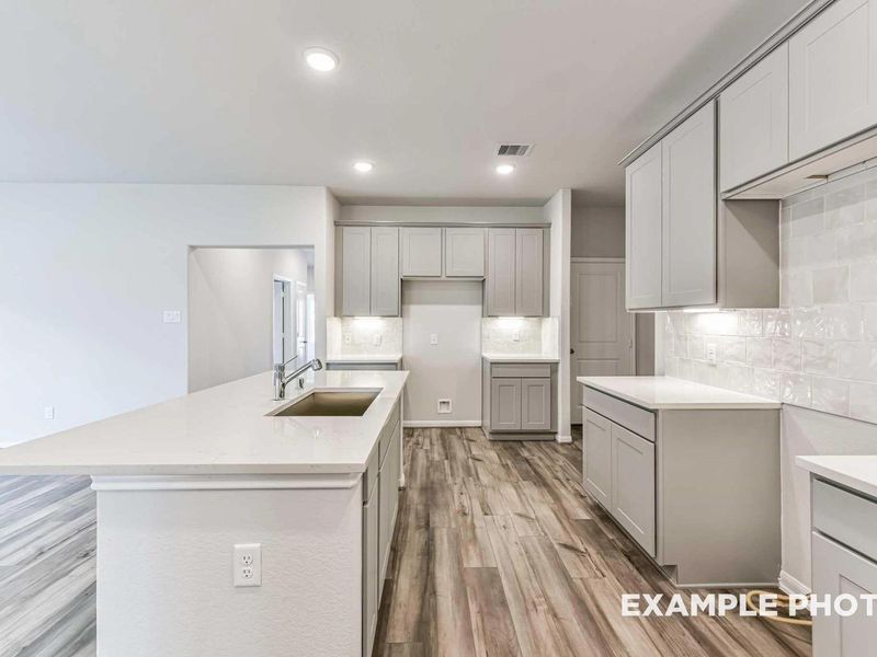 Furnished interior view inside a new home in Sunterra, Katy (Image 7).