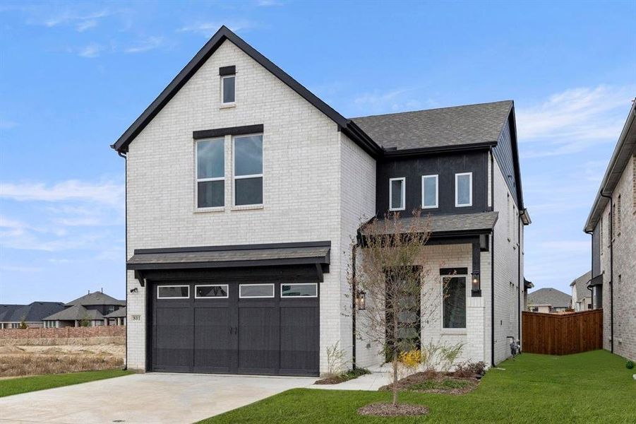 Front exterior of a new home in The Villages of Hurricane Creek, Anna, TX, highlighting curb appeal (Image 2).